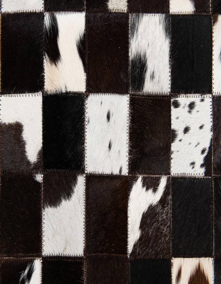 Detail image of  5' 1 x 8' Cowhide Stocks Rug