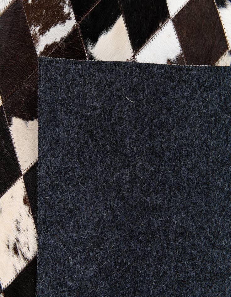 Detail image of  5' x 8' Cowhide Stocks Rug