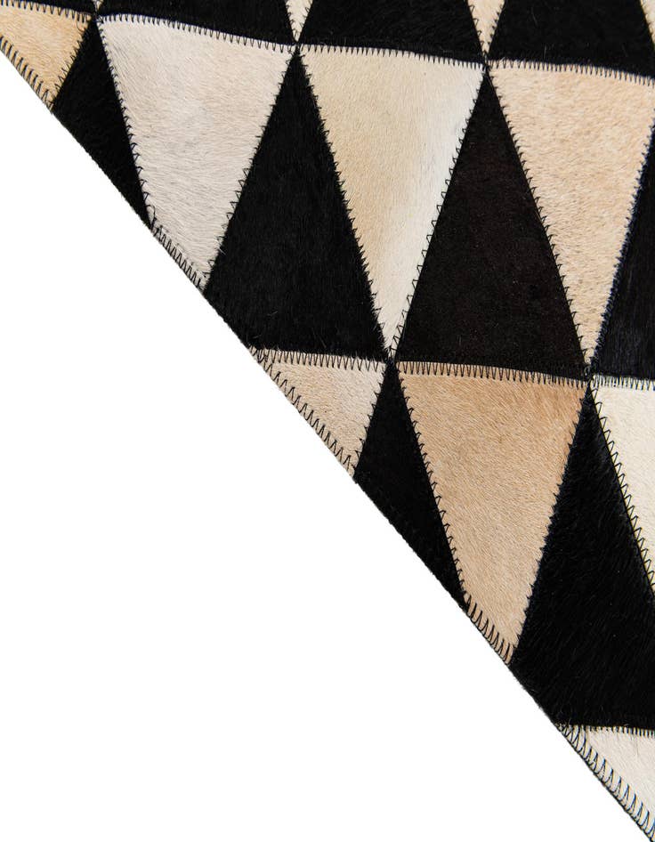 Detail image of  5' 1 x 8' 1 Cowhide Stocks Rug