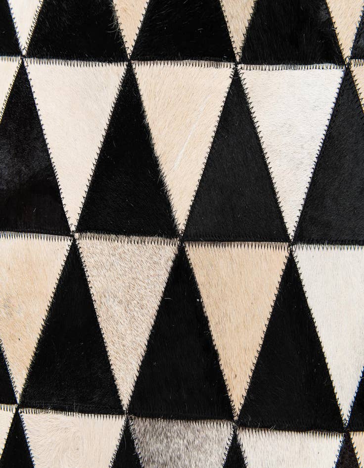 Detail image of  5' 1 x 8' 1 Cowhide Stocks Rug