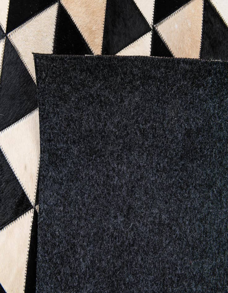 Detail image of  5' 1 x 8' 1 Cowhide Stocks Rug