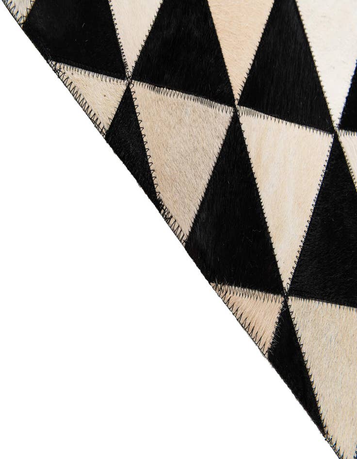 Detail image of  5' 1 x 8' 2 Cowhide Stocks Rug