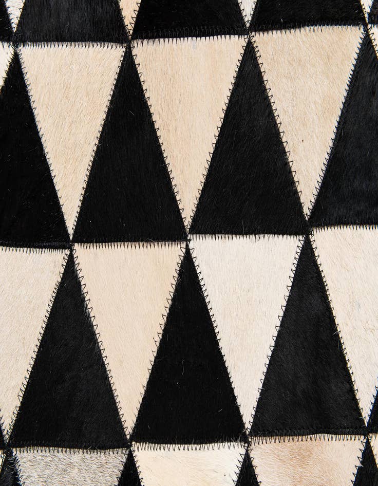 Detail image of  5' 1 x 8' 2 Cowhide Stocks Rug