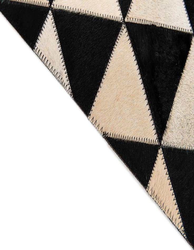 Detail image of  5' 1 x 8' 2 Cowhide Stocks Rug