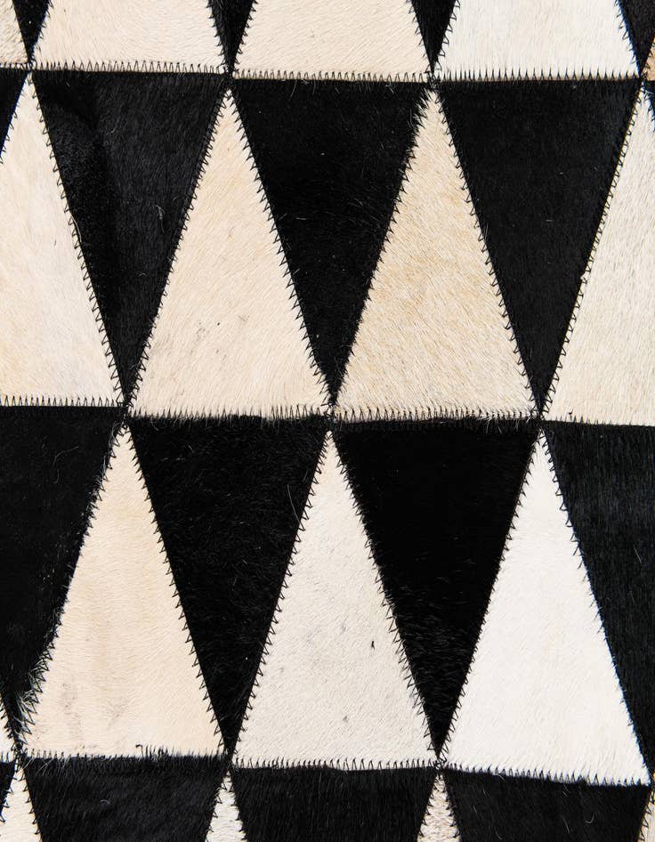 Detail image of  5' 1 x 8' 2 Cowhide Stocks Rug