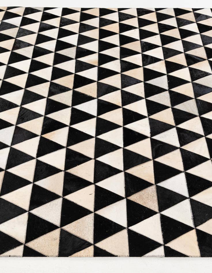 Detail image of  5' 1 x 8' 2 Cowhide Stocks Rug