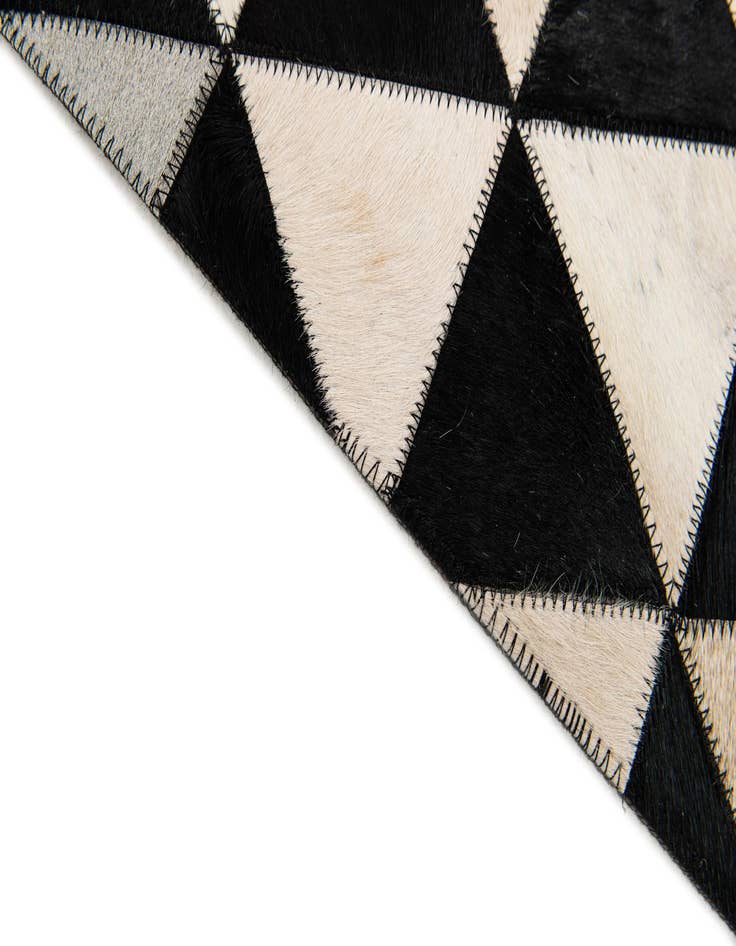 Detail image of  5' 1 x 8' 2 Cowhide Stocks Rug