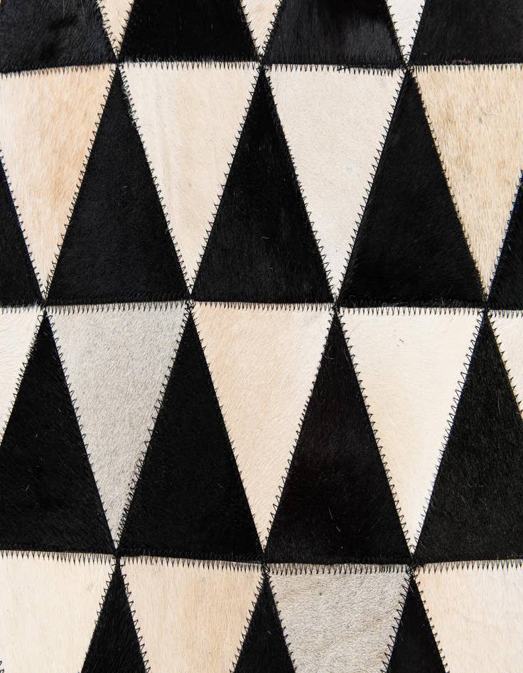 Detail image of  5' 1 x 8' 2 Cowhide Stocks Rug