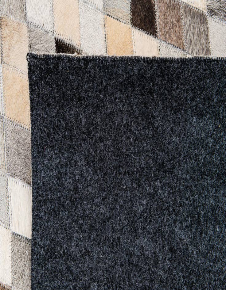 Detail image of  5' 8 x 7' 10 Cowhide Stocks Rug