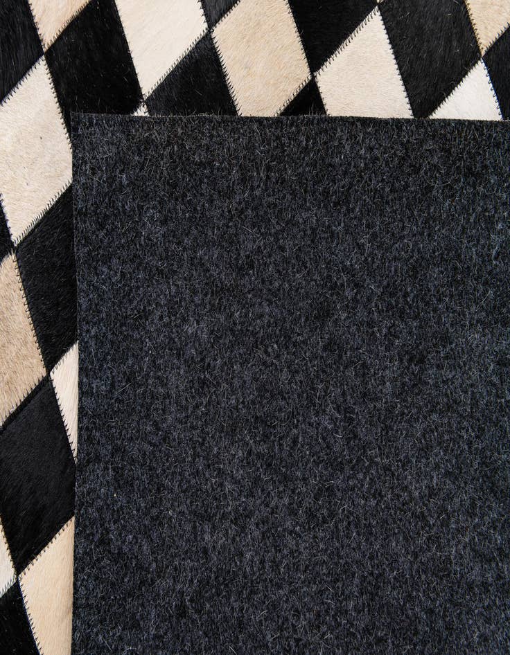 Detail image of  5' 8 x 7' 10 Cowhide Stocks Rug