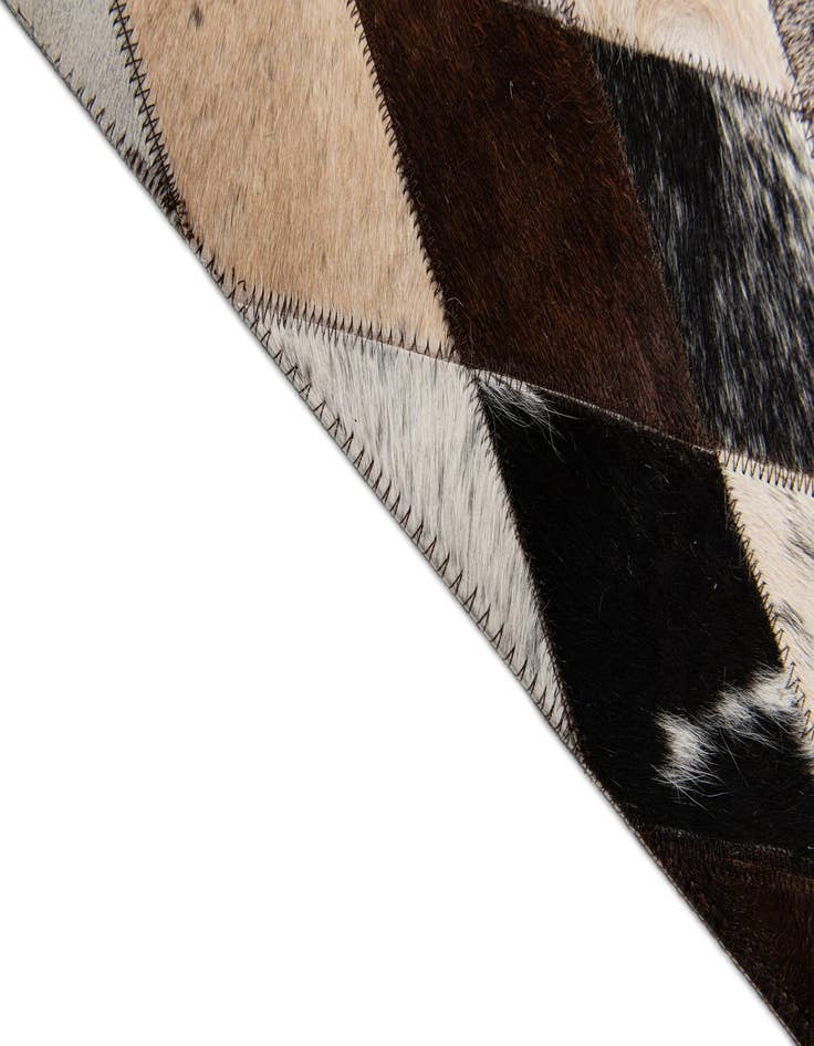 Detail image of  5' 8 x 7' 11 Cowhide Stocks Rug