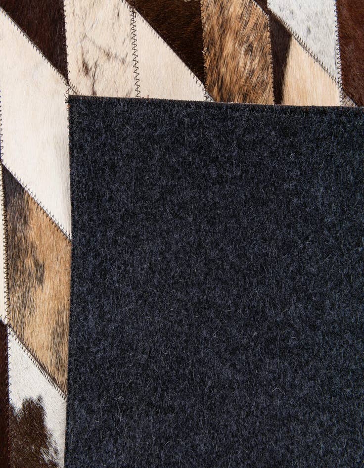 Detail image of  5' 8 x 7' 11 Cowhide Stocks Rug