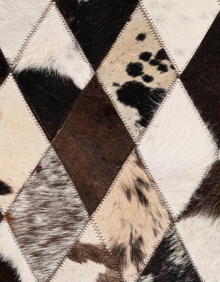 Detail image of  5' 7 x 8' Cowhide Stocks Rug