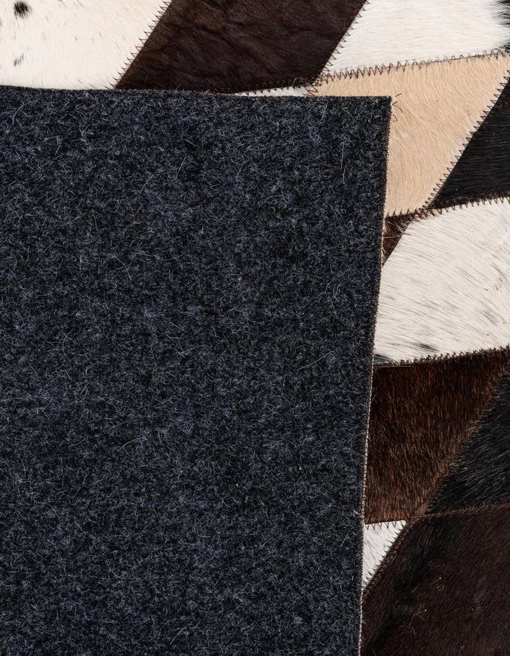 Detail image of  5' 7 x 8' Cowhide Stocks Rug