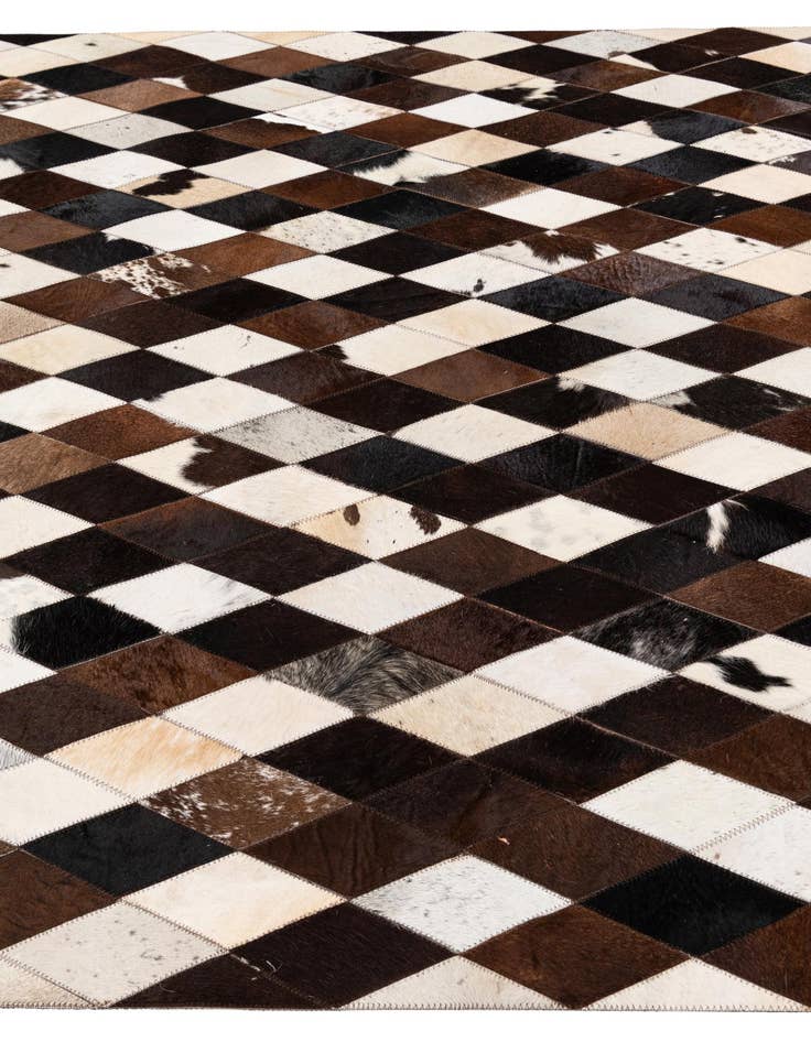 Detail image of  5' 3 x 8' Cowhide Stocks Rug