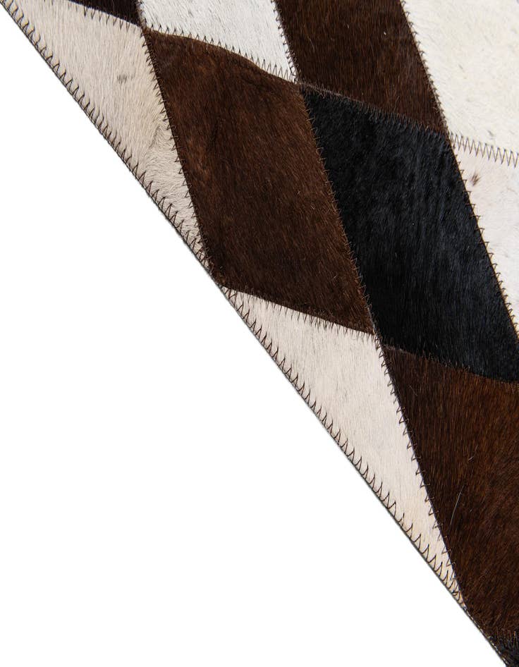 Detail image of  5' 3 x 8' Cowhide Stocks Rug