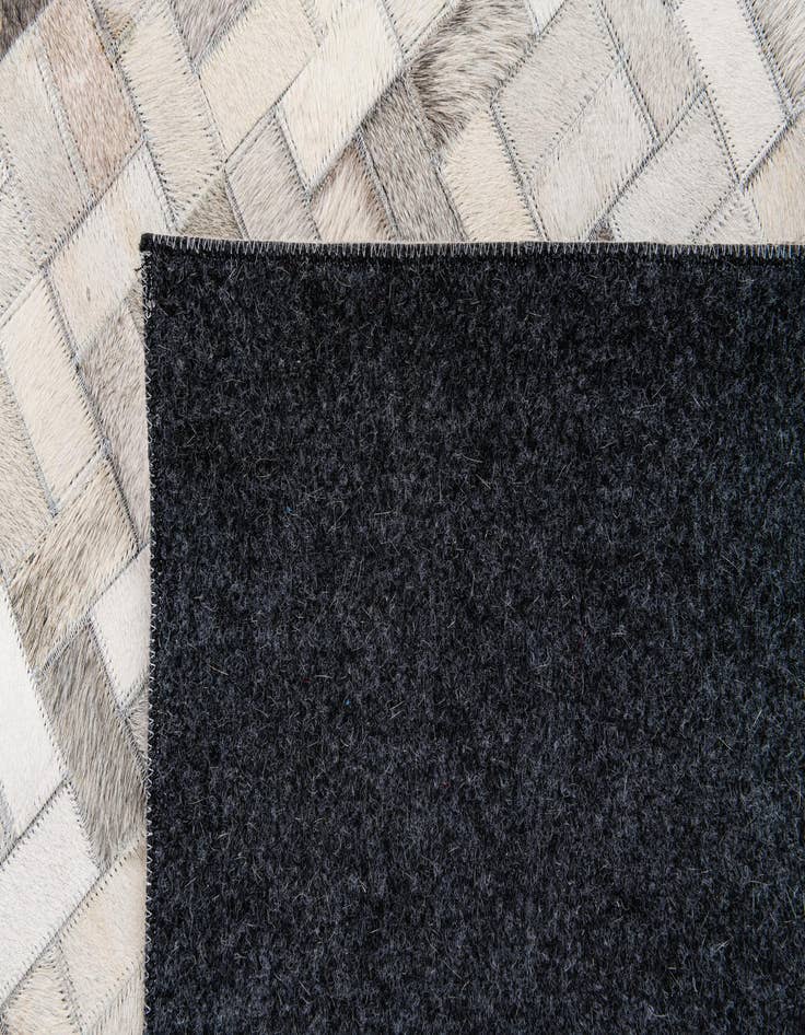 Detail image of  5' 7 x 7' 10 Cowhide Stocks Rug