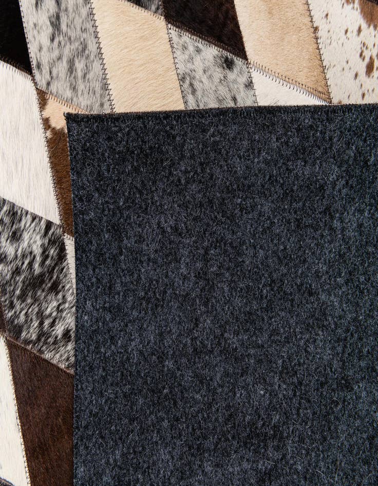 Detail image of  5' 7 x 7' 10 Cowhide Stocks Rug
