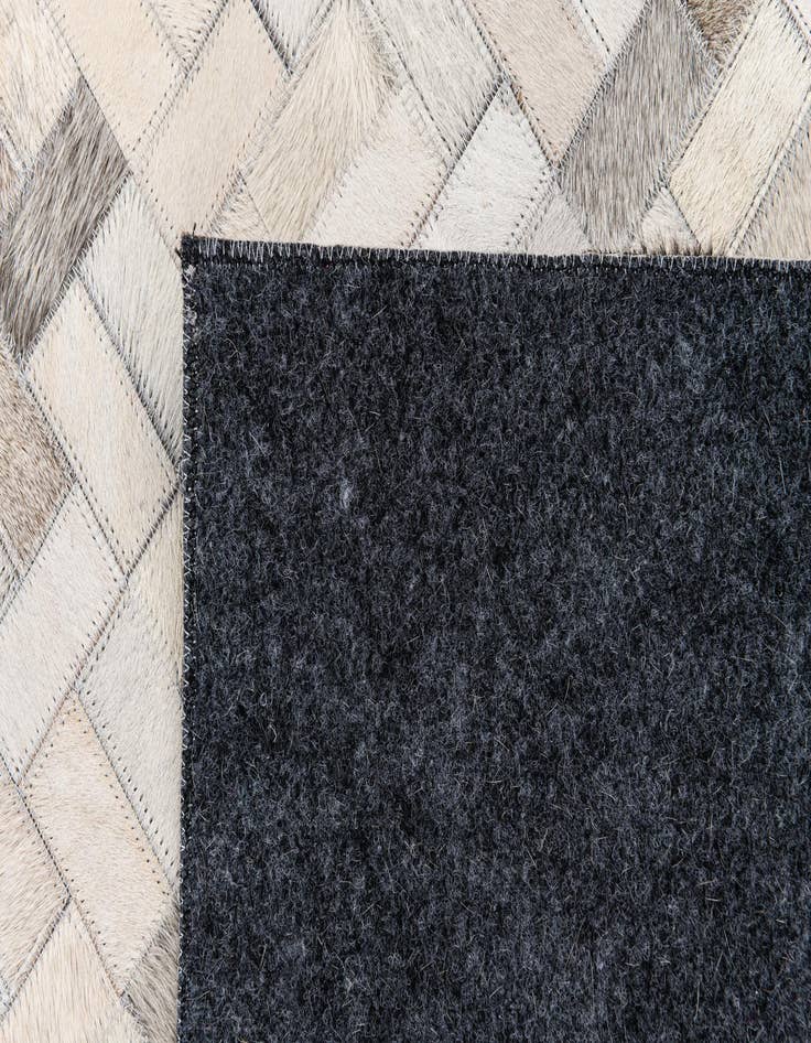 Detail image of  5' 7 x 8' Cowhide Stocks Rug