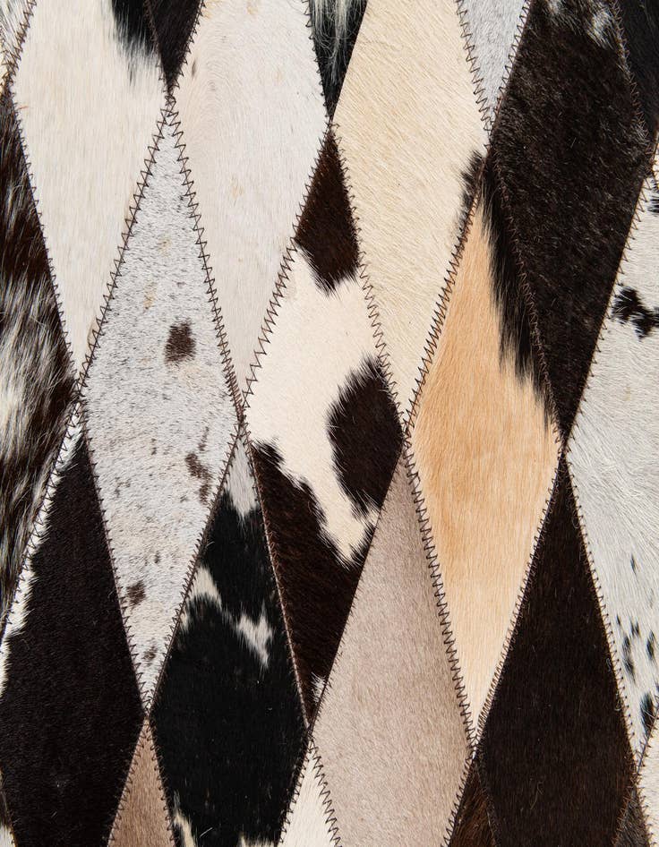 Detail image of  5' 7 x 8' Cowhide Stocks Rug