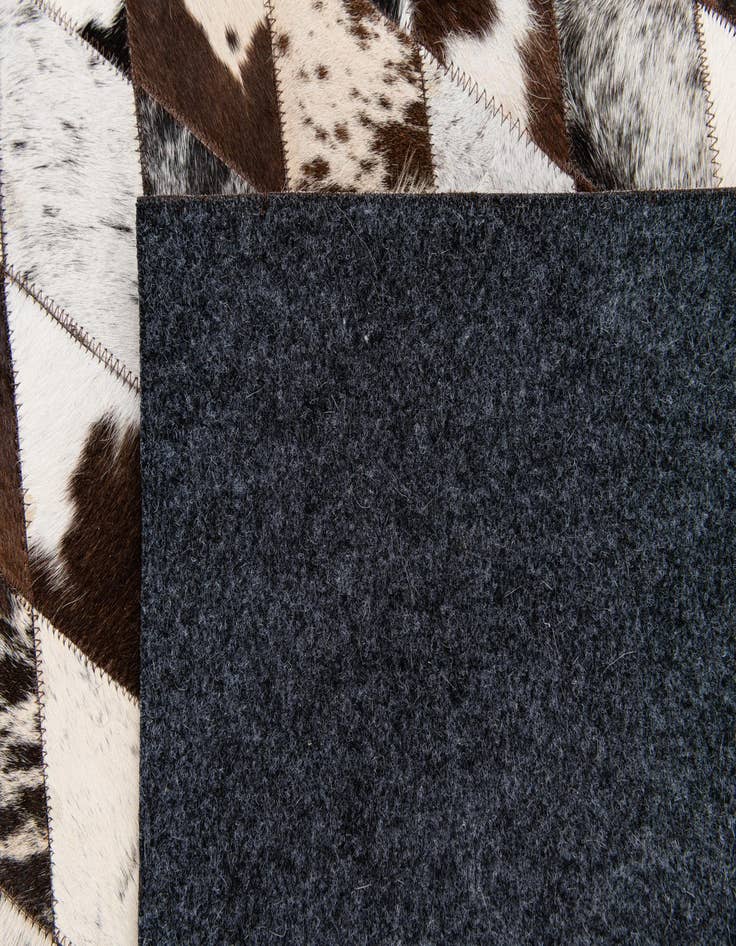 Detail image of  5' 8 x 7' 11 Cowhide Stocks Rug