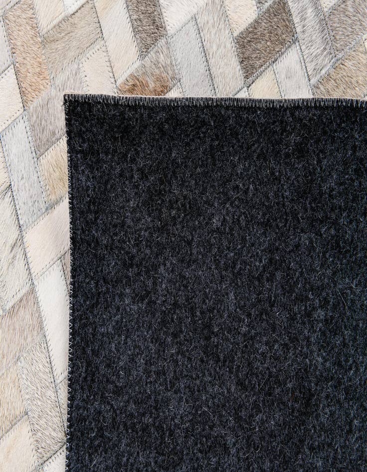 Detail image of  5' 7 x 7' 10 Cowhide Stocks Rug
