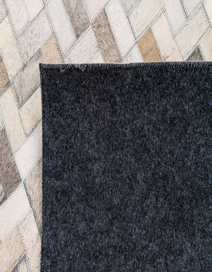 Detail image of  5' 7 x 7' 11 Cowhide Stocks Rug