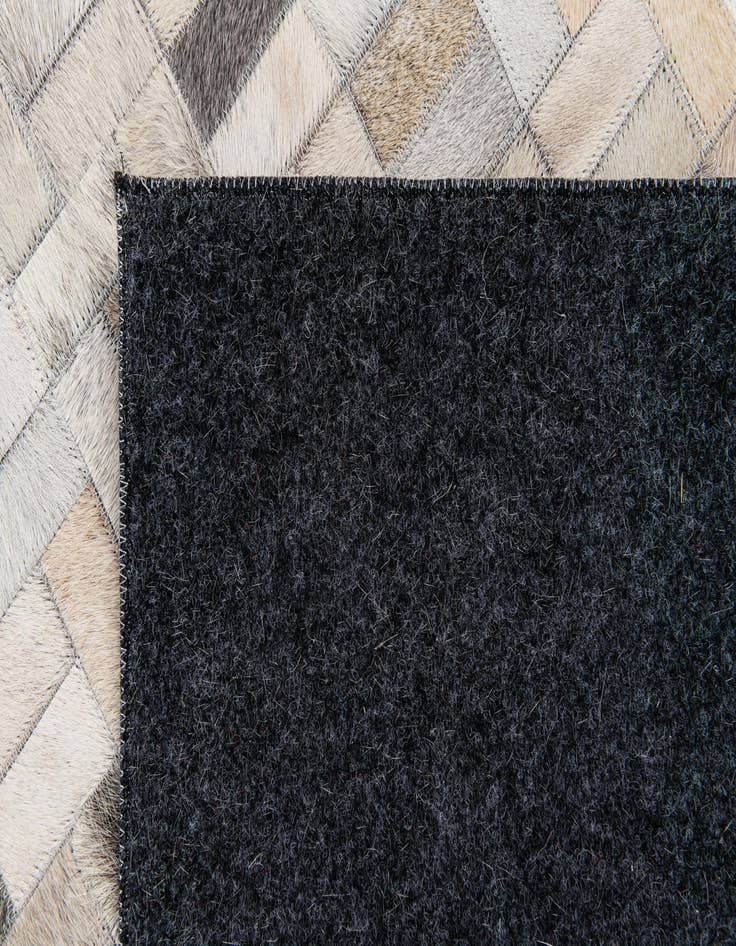 Detail image of  5' 7 x 7' 10 Cowhide Stocks Rug