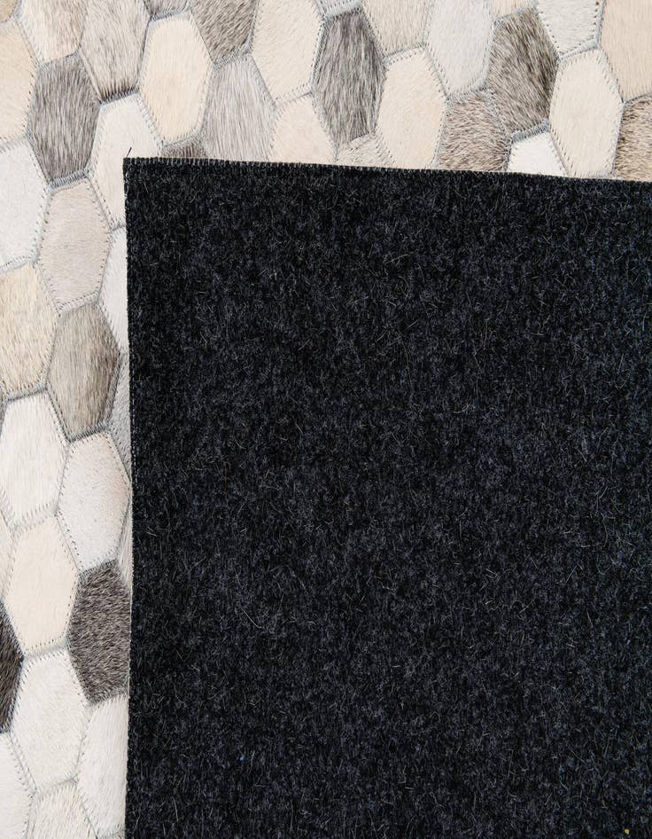 Detail image of  5' 8 x 7' 11 Cowhide Stocks Rug