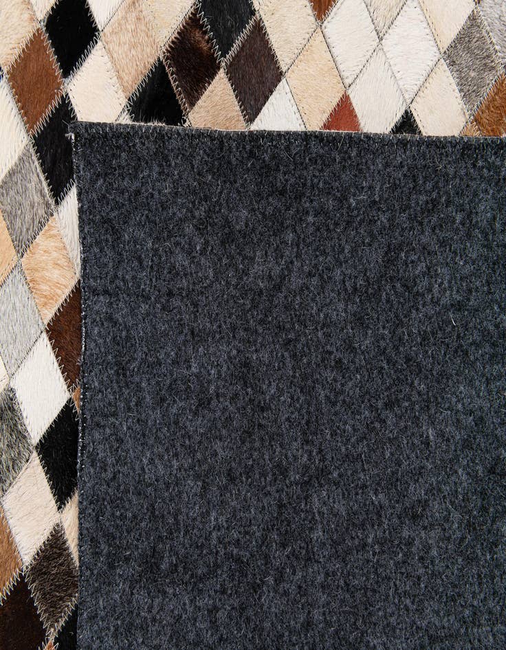 Detail image of  5' 1 x 8' Cowhide Stocks Rug
