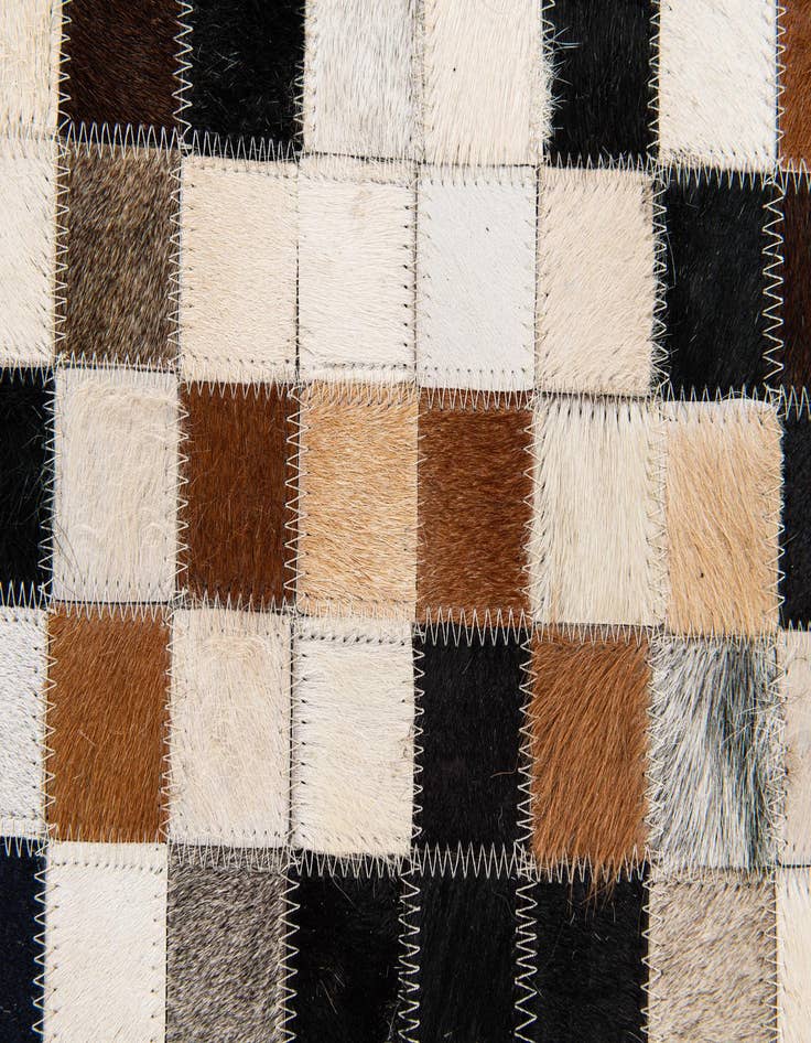 Detail image of  5' 1 x 7' 11 Cowhide Stocks Rug