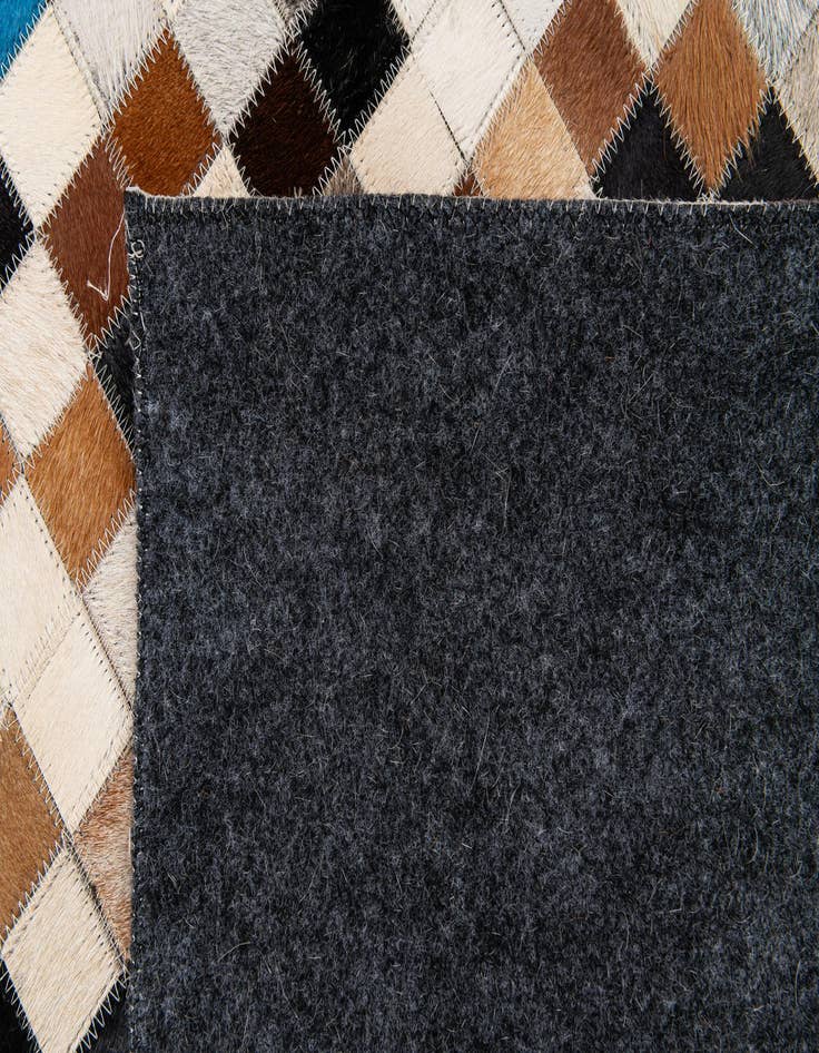 Detail image of  5' 1 x 7' 11 Cowhide Stocks Rug