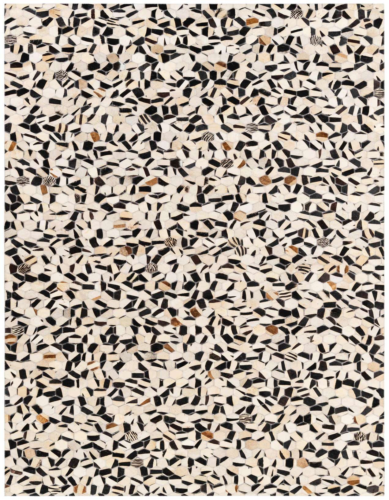 A rectangular 5x8 modern cowhide rug featuring a multi-colored patchwork design of black, white, and brown irregular shapes.