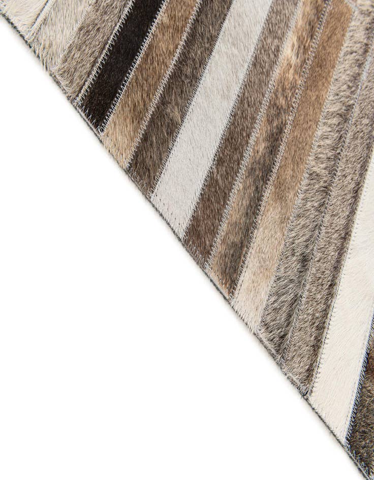 Detail image of  5' 1 x 8' Cowhide Stocks Rug