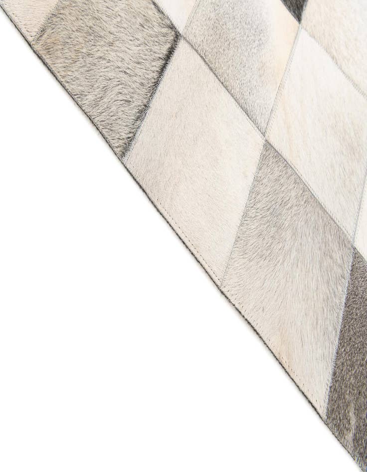 Detail image of  5' x 7' 11 Cowhide Stocks Rug