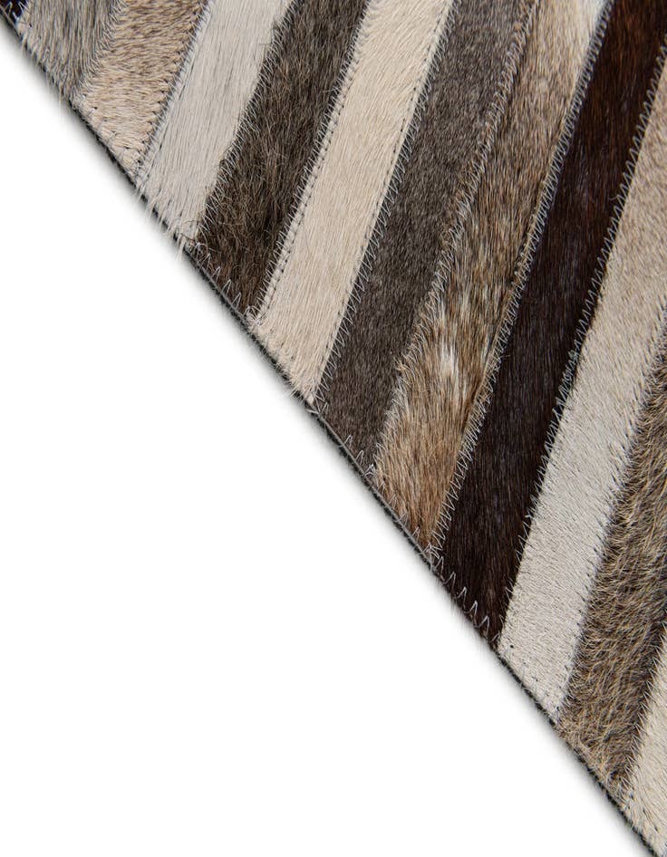 Detail image of  5' 1 x 7' 11 Cowhide Stocks Rug