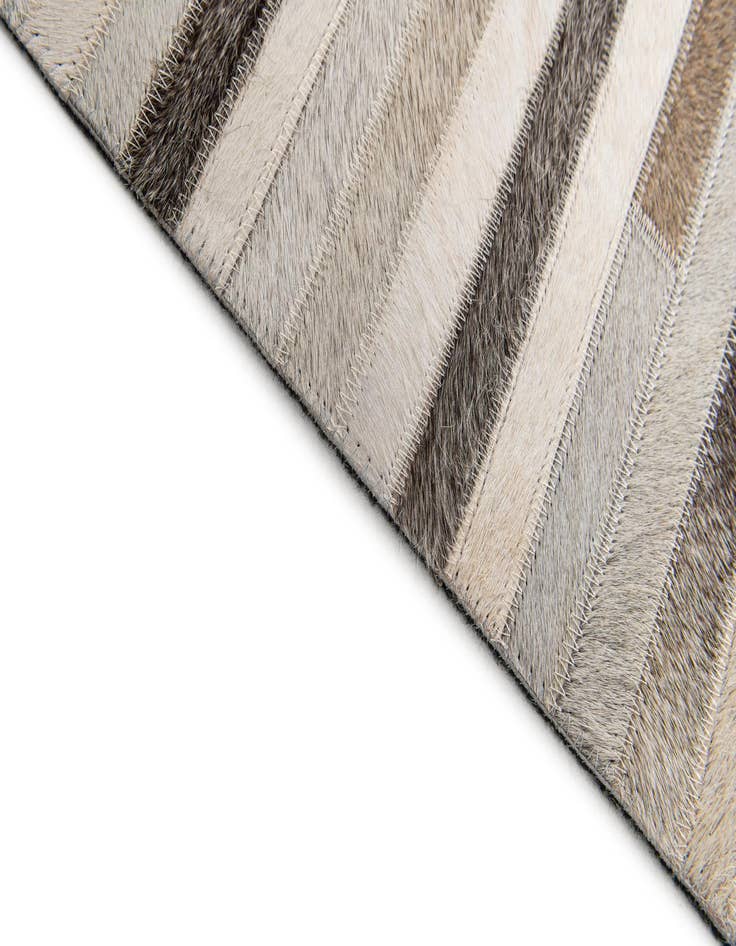 Detail image of  5' 1 x 8' Cowhide Stocks Rug