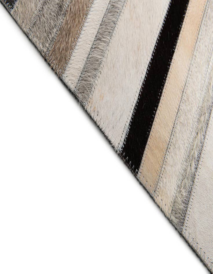 Detail image of  5' 1 x 7' 11 Cowhide Stocks Rug