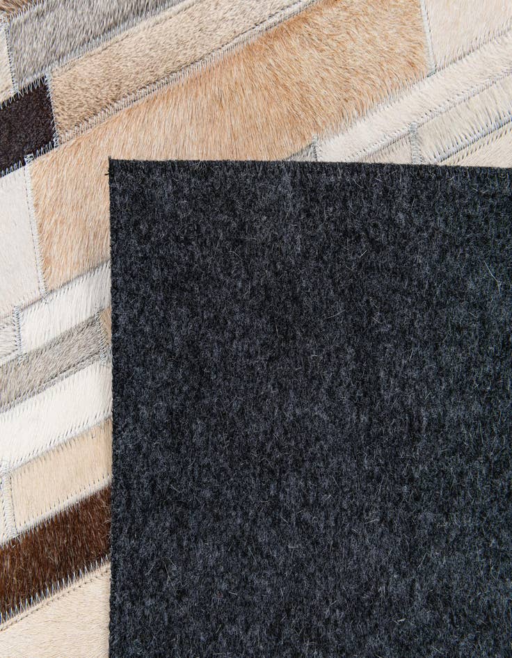Detail image of  5' 1 x 7' 11 Cowhide Stocks Rug