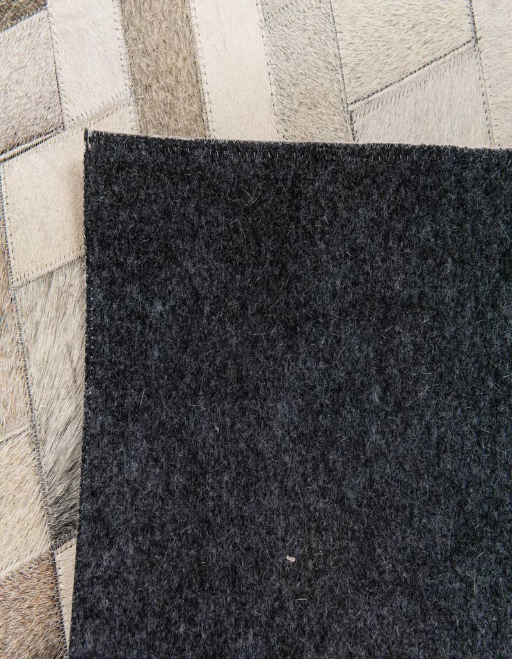 Detail image of  5' x 7' 10 Cowhide Stocks Rug