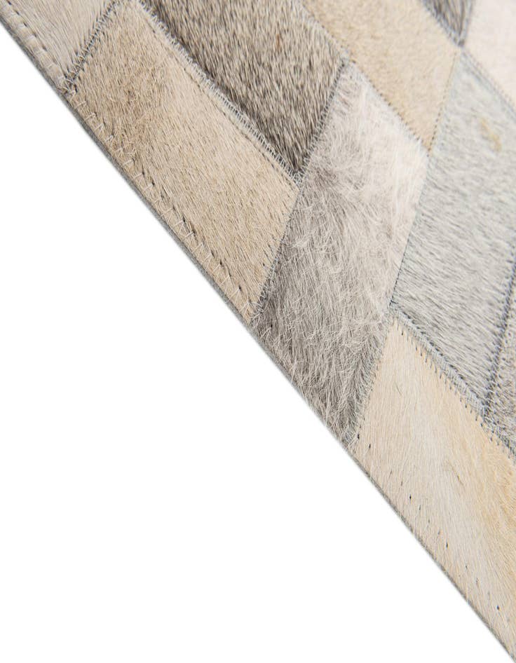 Detail image of  5' 1 x 8' Cowhide Stocks Rug