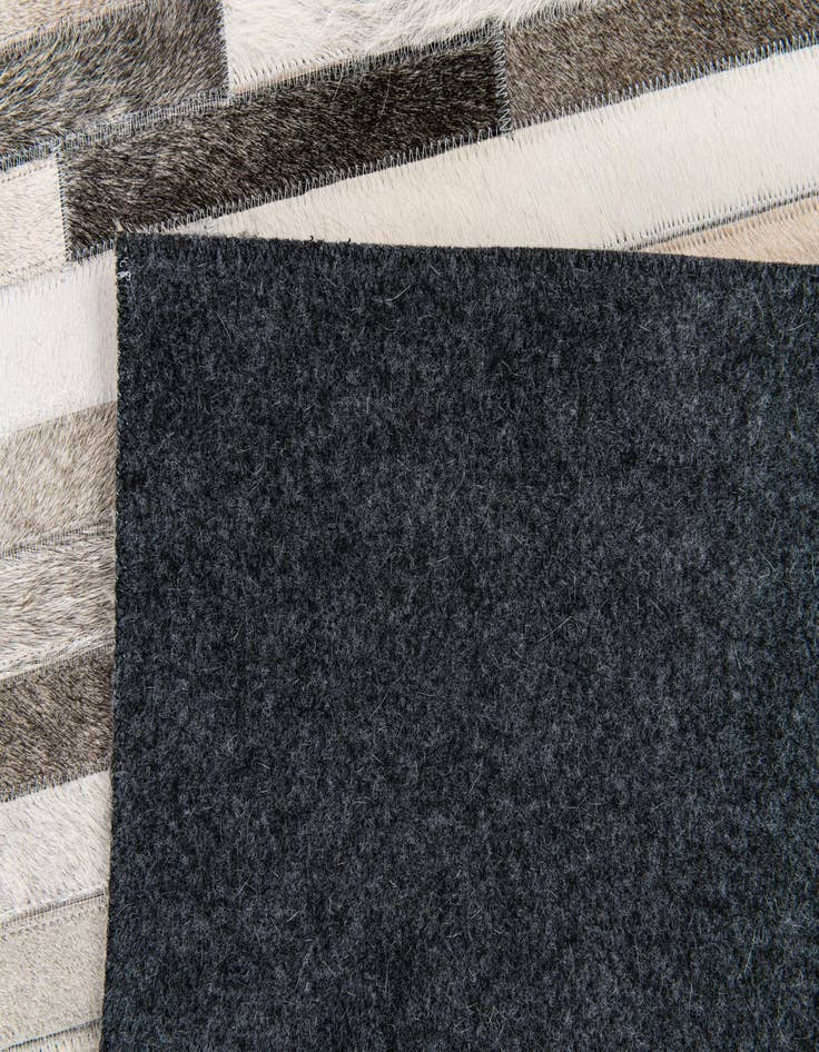 Detail image of 5' 1 x 8' Cowhide Stocks Rug