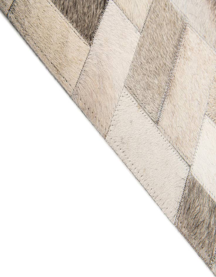 Detail image of  5' x 7' 11 Cowhide Stocks Rug