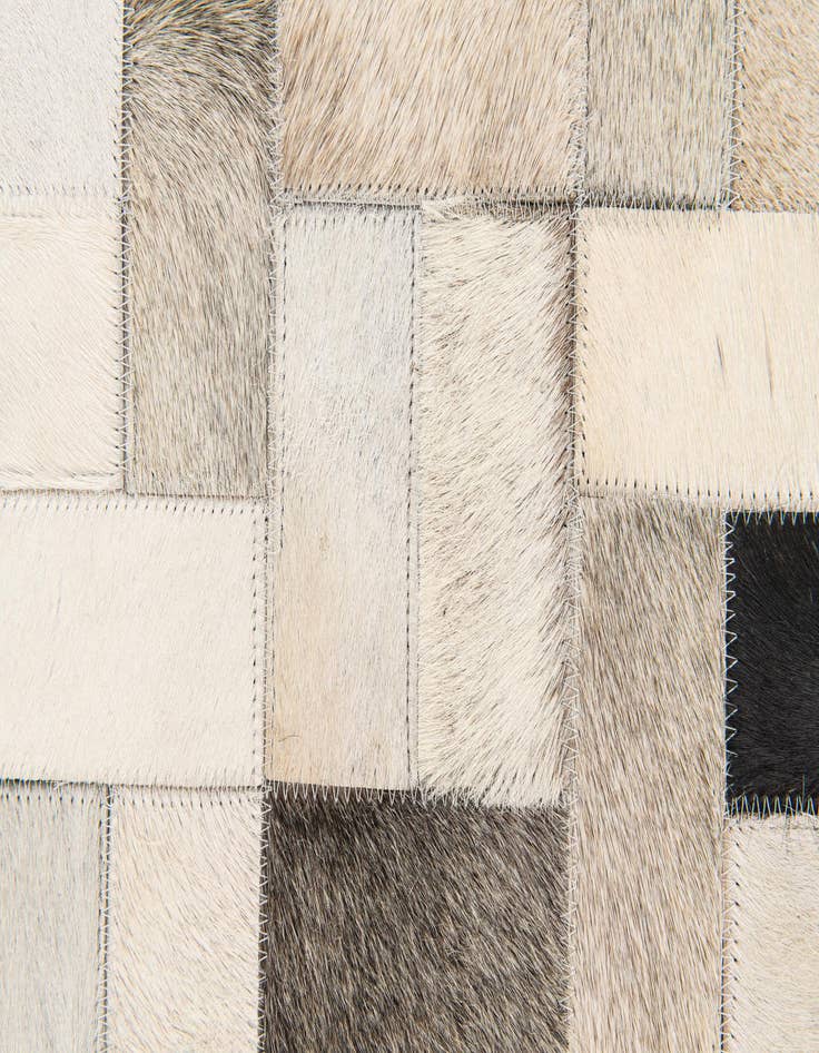 Detail image of  5' x 7' 11 Cowhide Stocks Rug