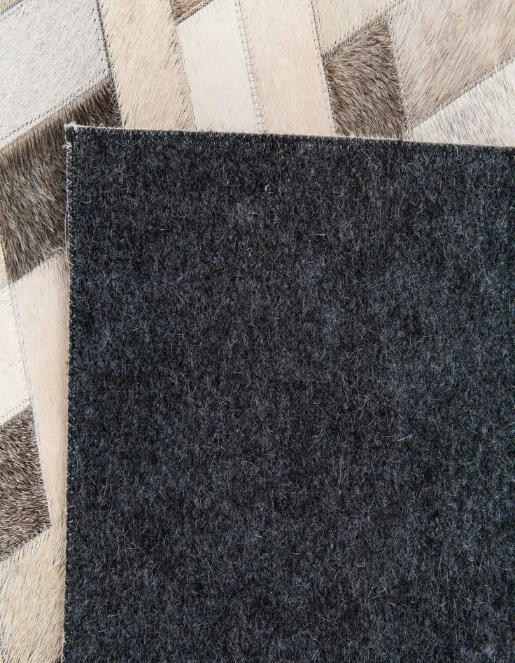 Detail image of  5' x 7' 11 Cowhide Stocks Rug