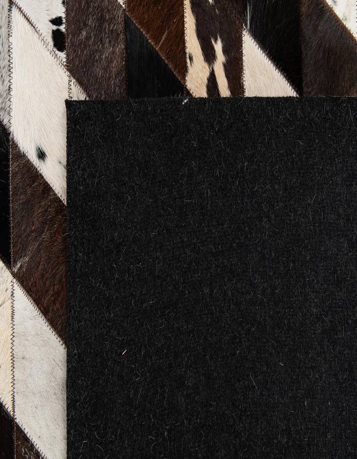 Detail image of  5' 2 x 8' 1 Cowhide Stocks Rug