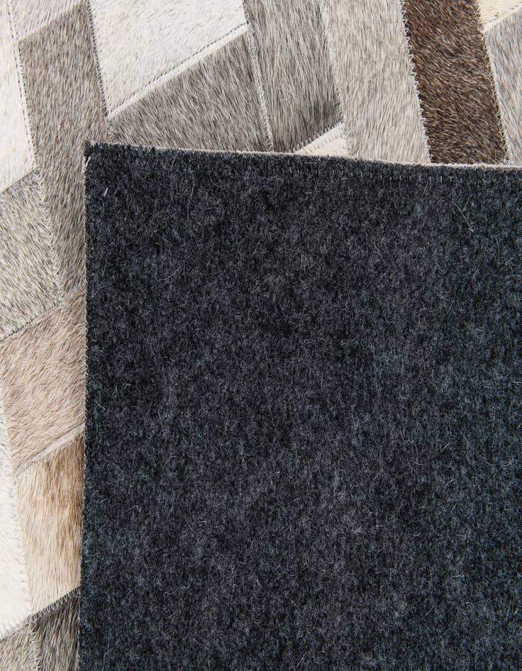 Detail image of  5' 1 x 8' Cowhide Stocks Rug
