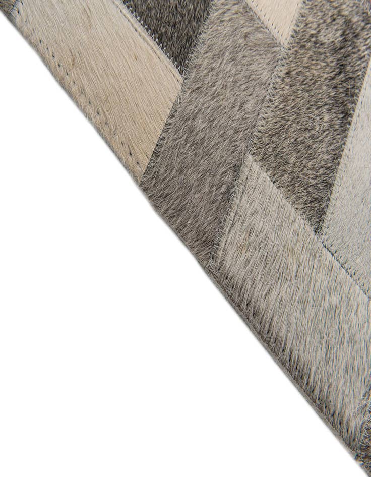 Detail image of  5' 1 x 8' Cowhide Stocks Rug