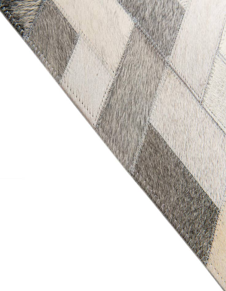 Detail image of  5' 1 x 8' Cowhide Stocks Rug