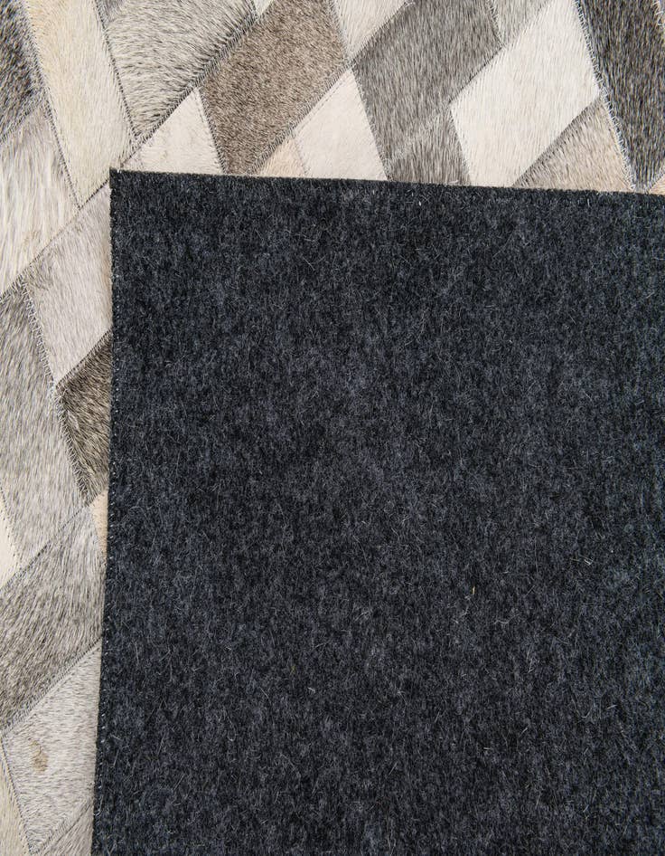 Detail image of  5' x 8' Cowhide Stocks Rug